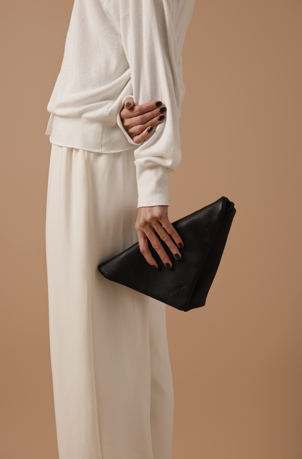 THE NOMI CLUTCH