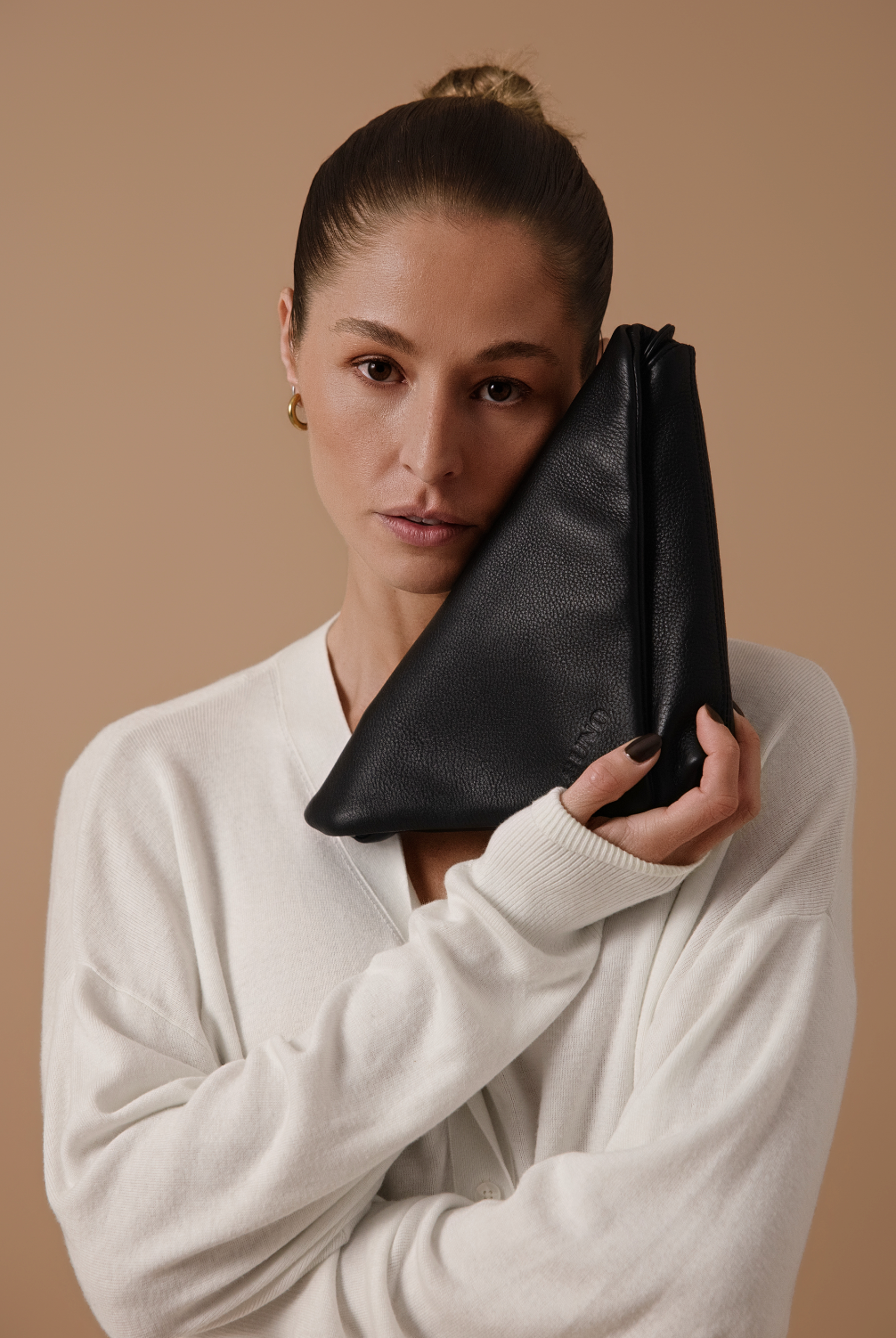 THE NOMI CLUTCH